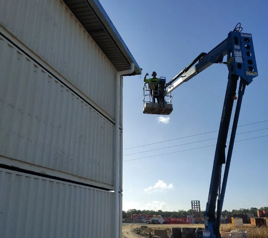 2026 May 28 JN49777 Jarrod and Harvey Jarrod on EWP Finished fArther side of shed_Waterloo.jpg